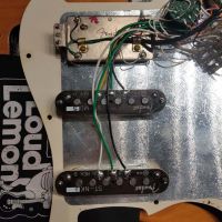 Fender American Deluxe Stratocaster HSS Amber 2009 USA электрогитара