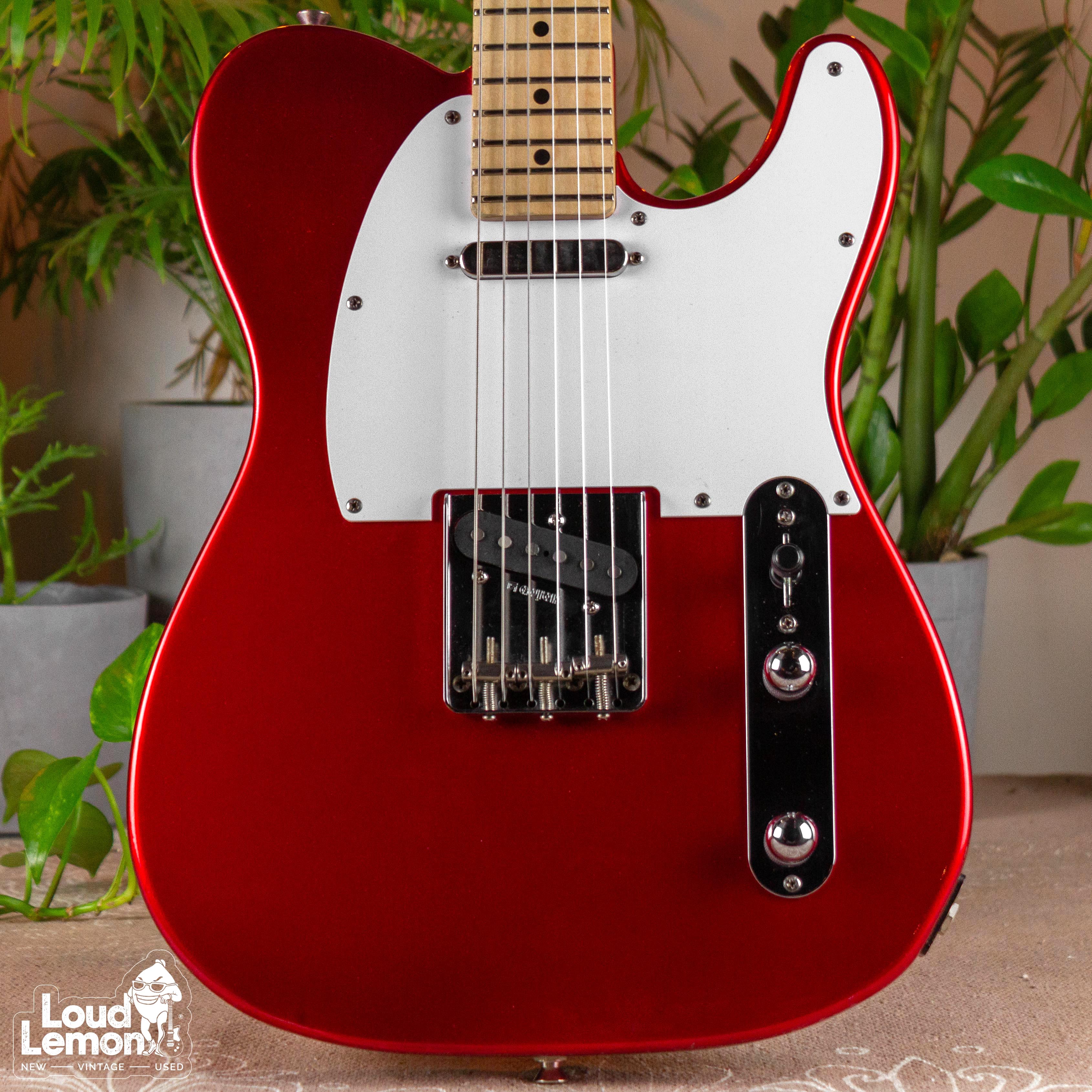 Loud guitar. Red Telecaster. Transparent Red Telecaster.